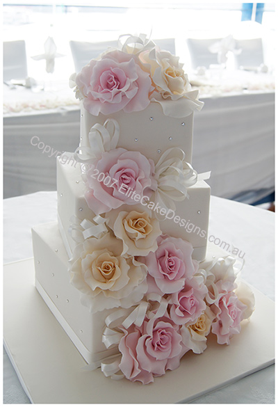 Wedding Cake with ivory and pink roses and swarovski crystals